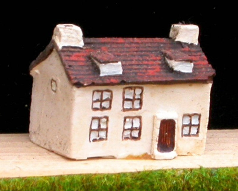 V5 Maison avec chien assis