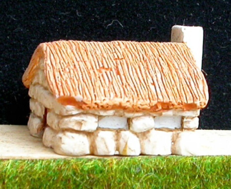 P1 Maison en pierre et toit de chaume